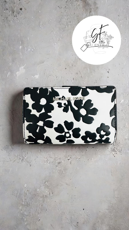Cartera mediana de piel saffiano blanca con flores negras para mujer